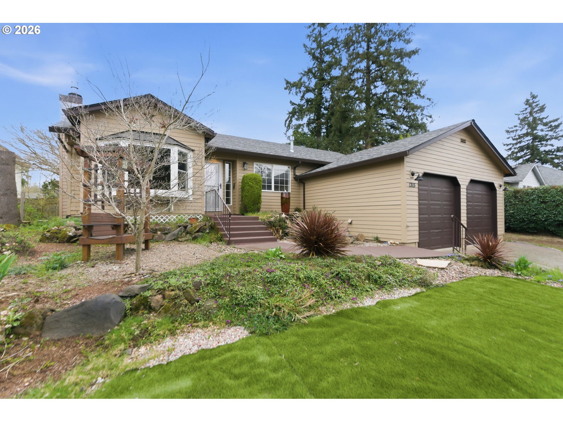 1315 High Street Gladstone, OR 97027 - Photo 3 of 36 a front view of a house with a yard