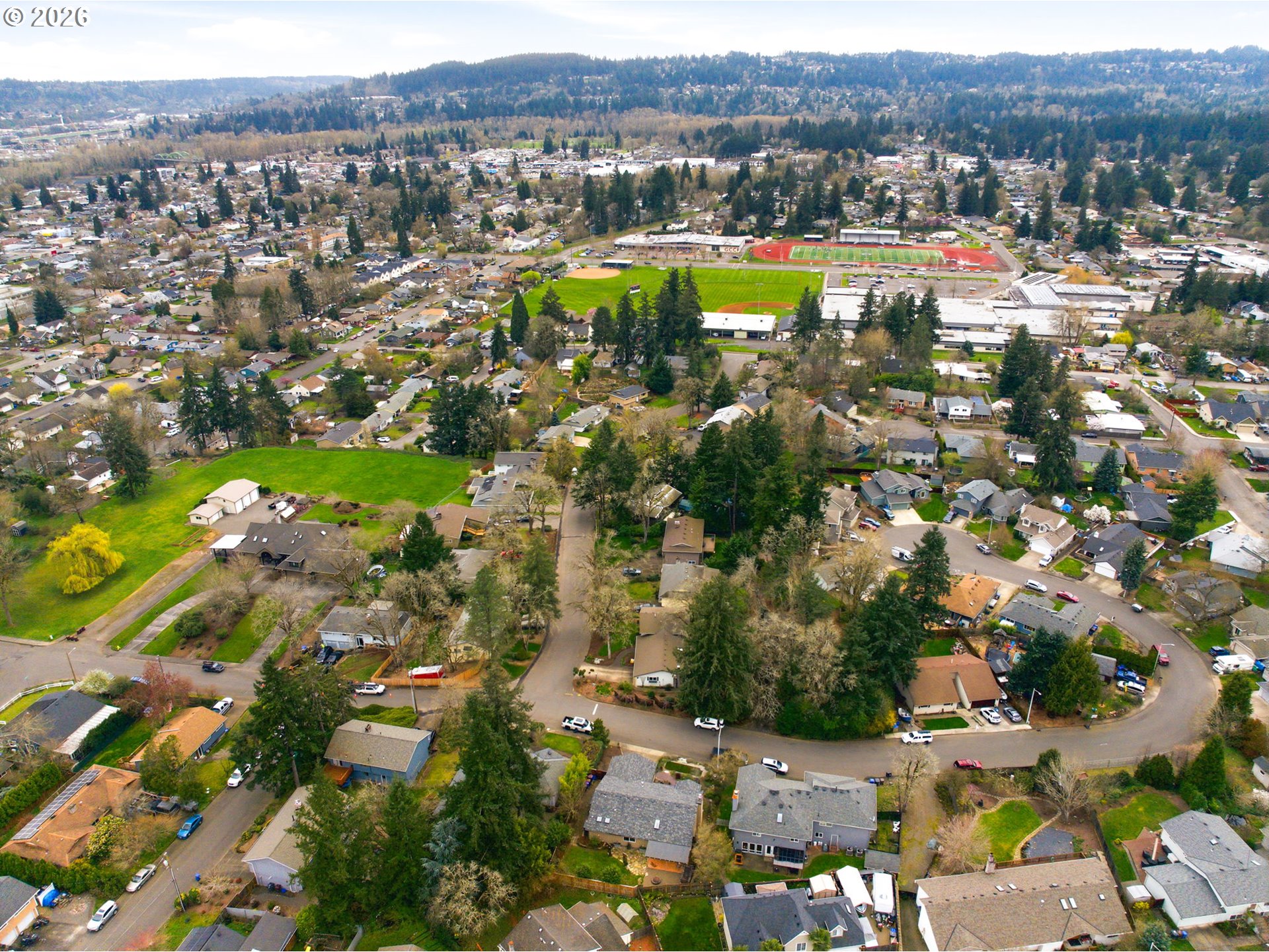 1315 High Street Gladstone, OR 97027 - Photo 34 of 36 an aerial view of residential houses and lake view