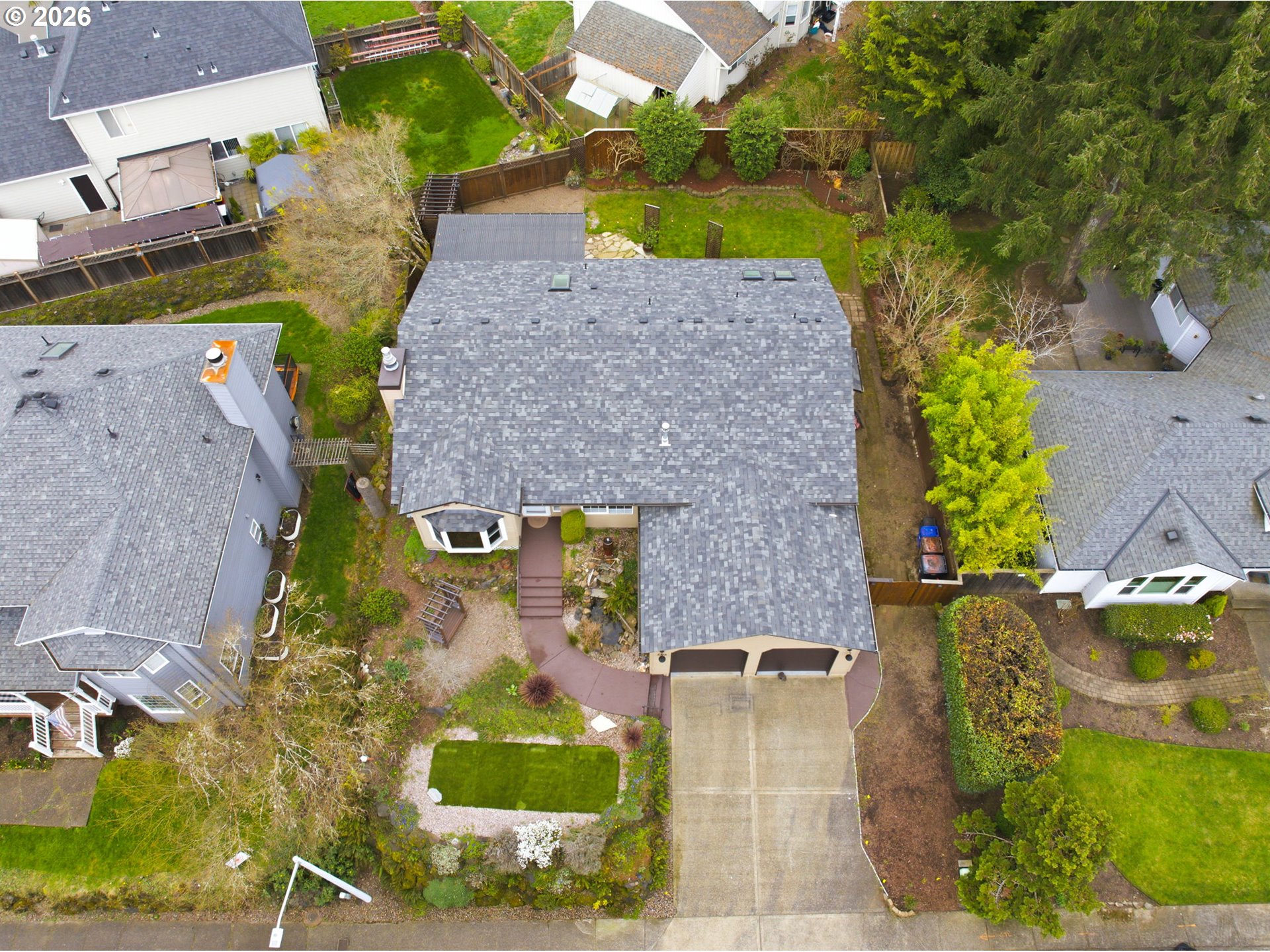 1315 High Street Gladstone, OR 97027 - Photo 36 of 36 an aerial view of a house with a swimming pool