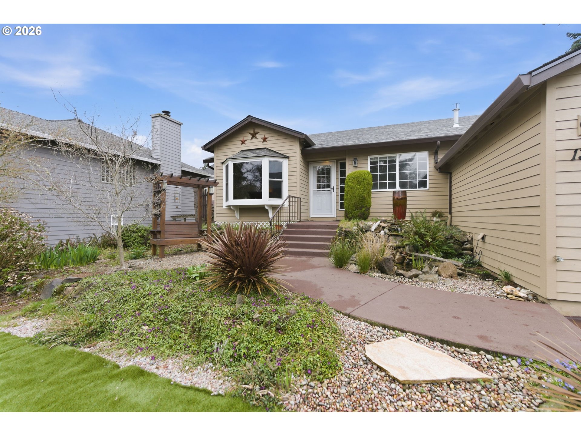 1315 High Street Gladstone, OR 97027 - Photo 4 of 36 a front view of a house with a yard