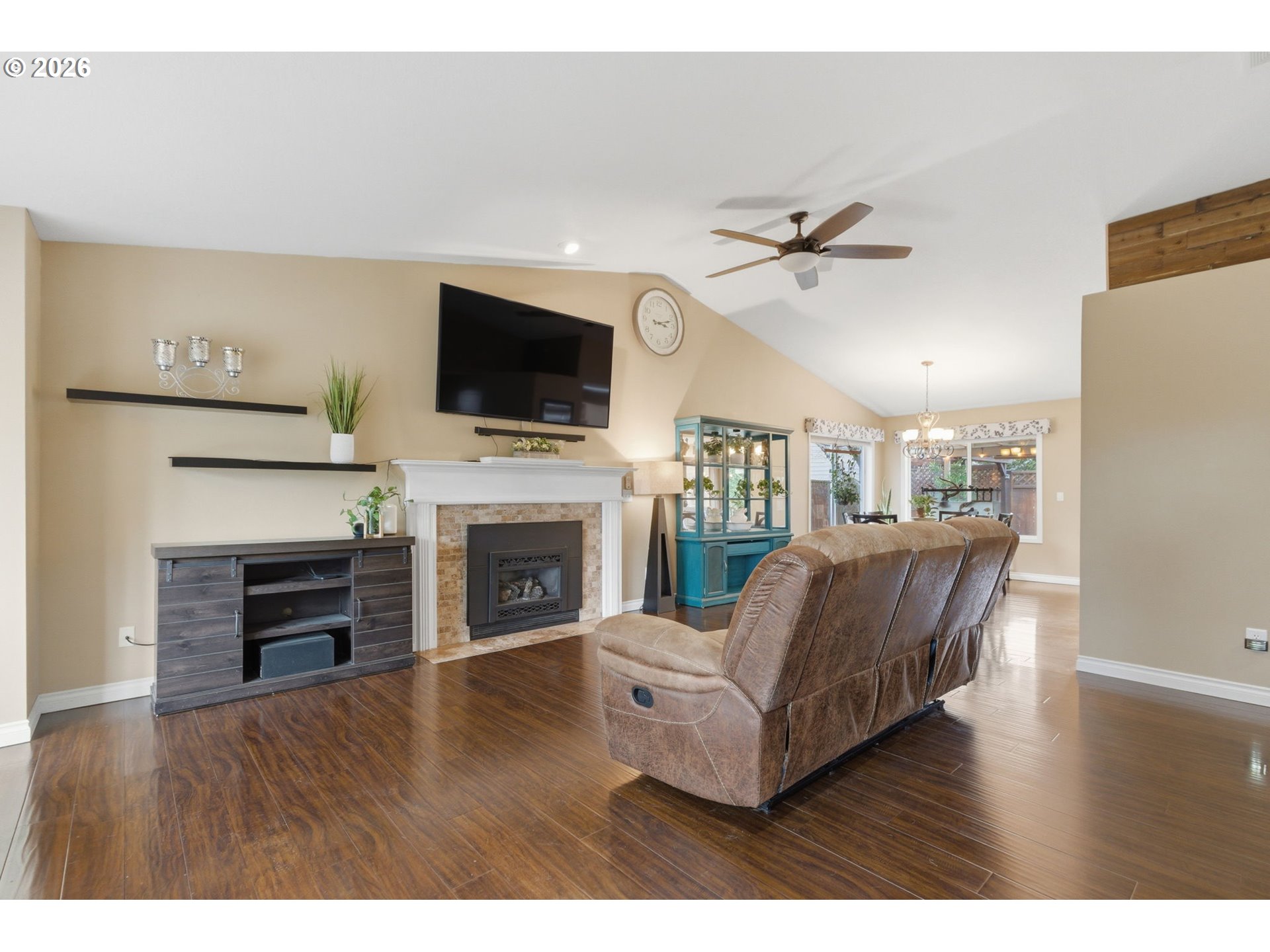 1315 High Street Gladstone, OR 97027 - Photo 7 of 36 a living room with furniture fireplace and flat screen tv