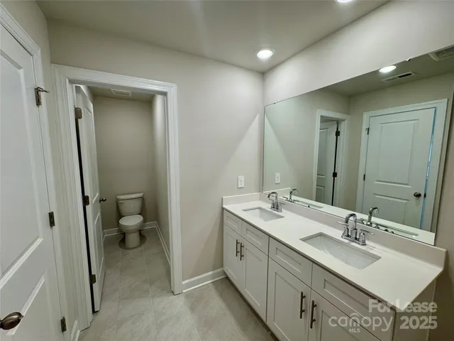 a view of backyard of house with outdoor seating