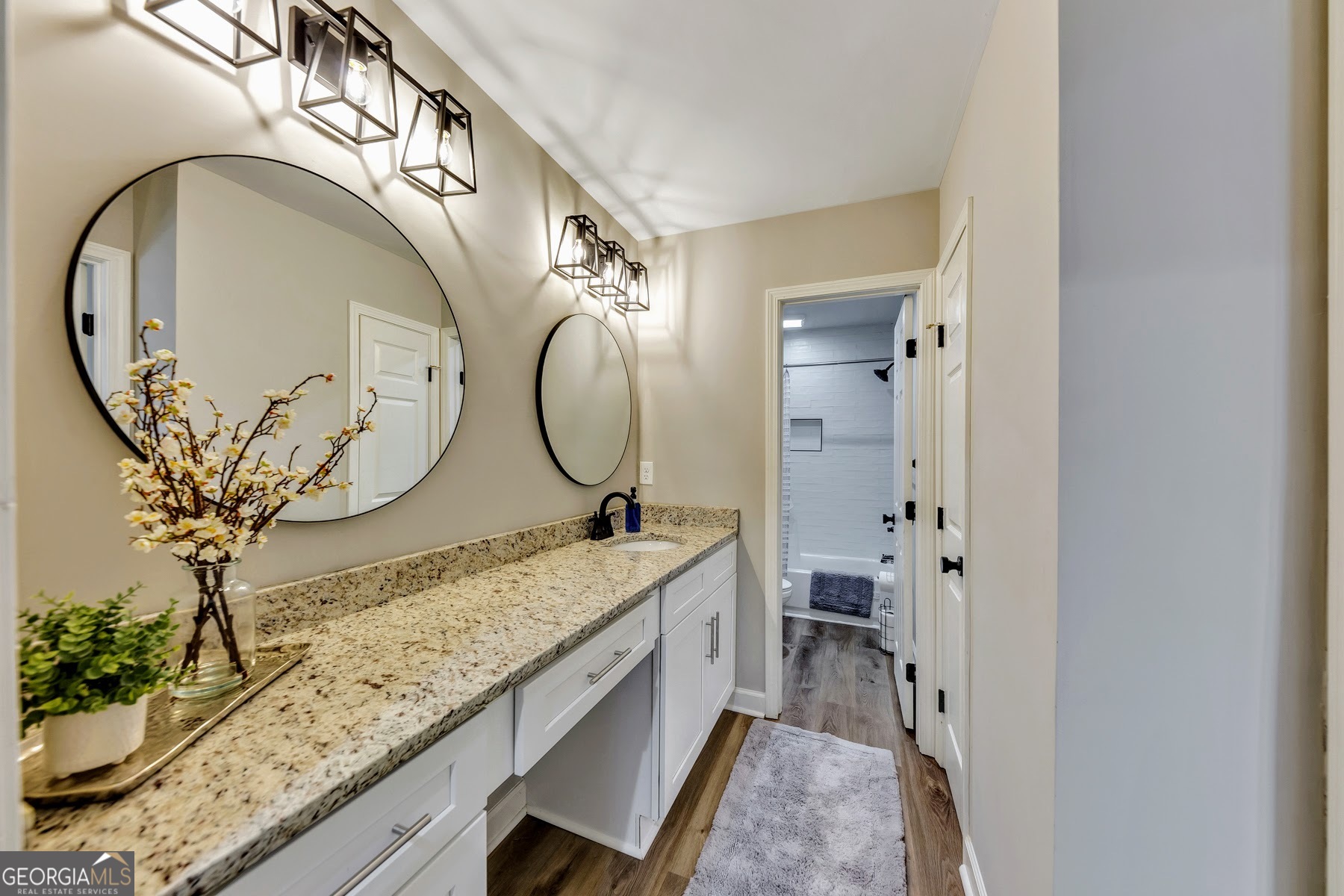 1018 Falling Valley Court Southeast Smyrna, GA 30080 - Photo 15 of 25 a bathroom with a granite countertop sink mirror and vanity