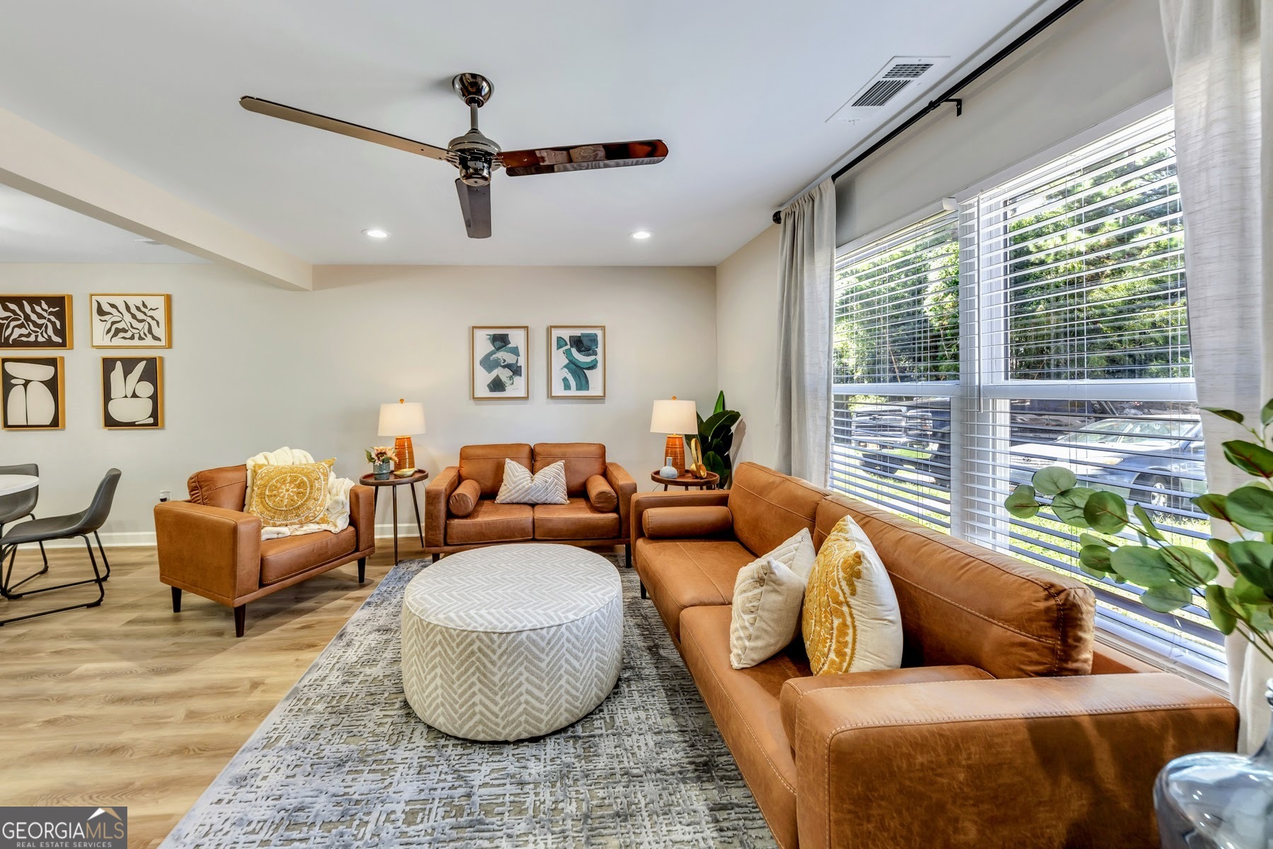 1018 Falling Valley Court Southeast Smyrna, GA 30080 - Photo 2 of 25 a living room with furniture and a large window