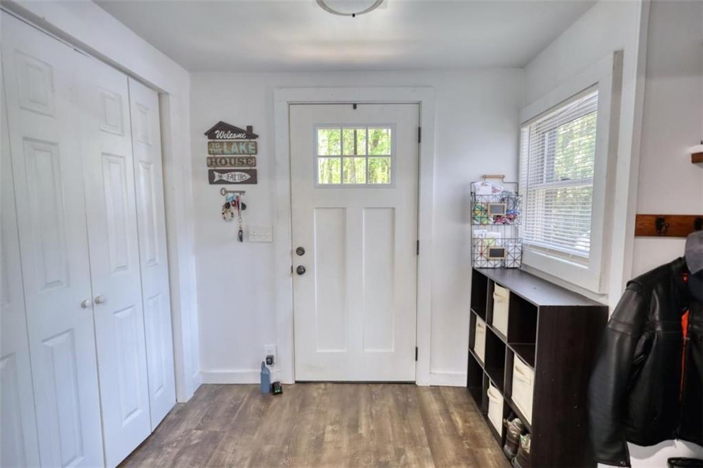 89 Miss Sarah Road Monticello, GA 31064 - Photo 14 of 77 a view of room with window and wooden floor