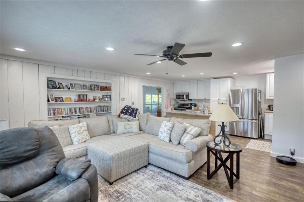 89 Miss Sarah Road Monticello, GA 31064 - Photo 21 of 77 a living room with furniture and a view of kitchen