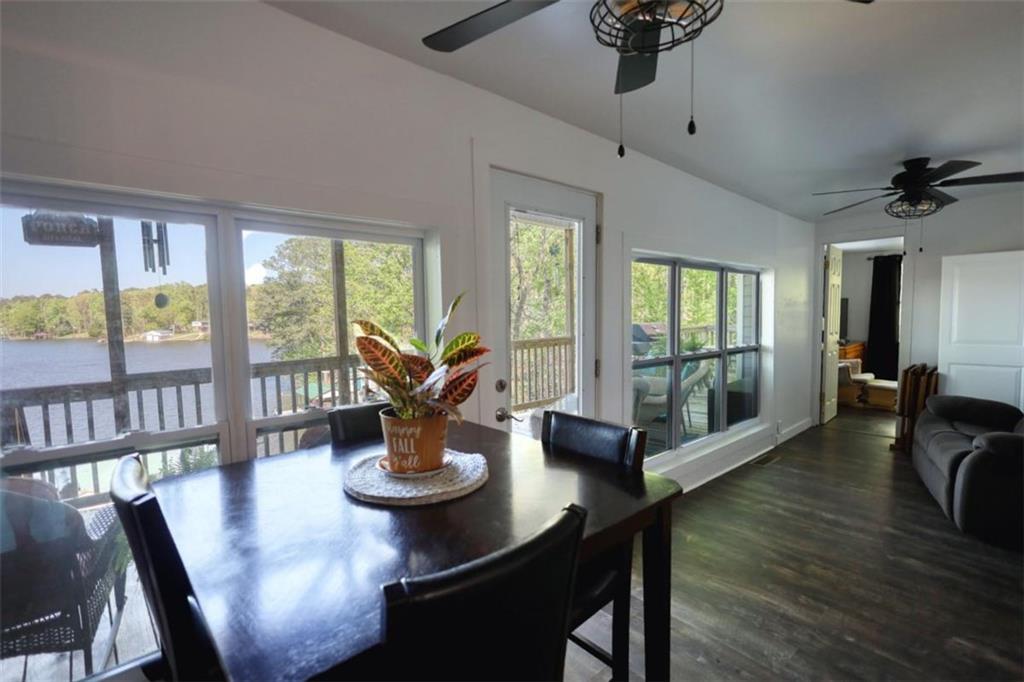 89 Miss Sarah Road Monticello, GA 31064 - Photo 30 of 77 a living room with furniture and a large window