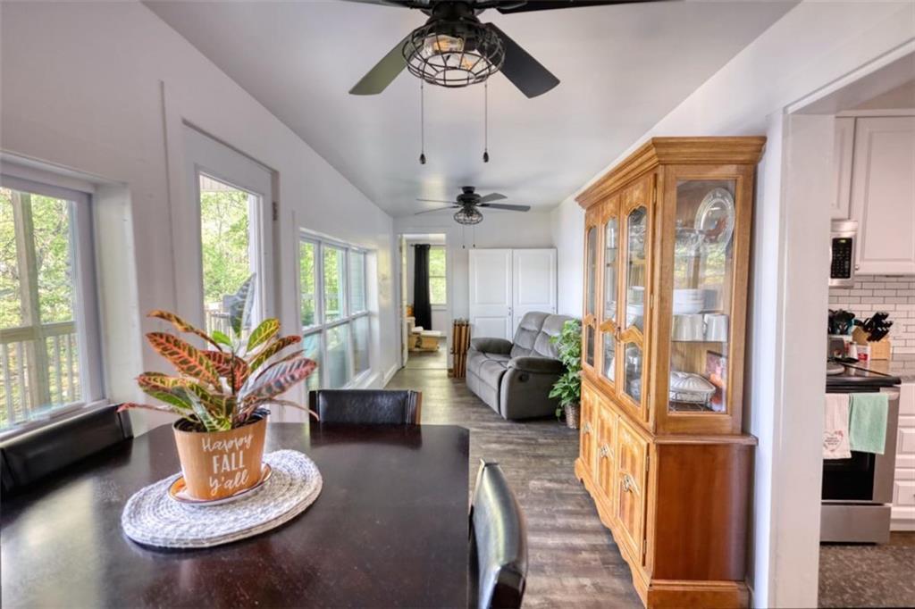 89 Miss Sarah Road Monticello, GA 31064 - Photo 31 of 77 a living room with furniture chandelier and a large window