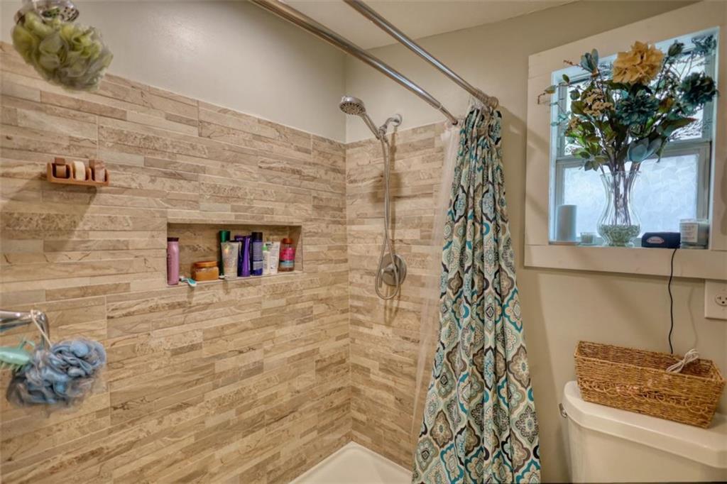 89 Miss Sarah Road Monticello, GA 31064 - Photo 40 of 77 a bathroom with a shower and a sink