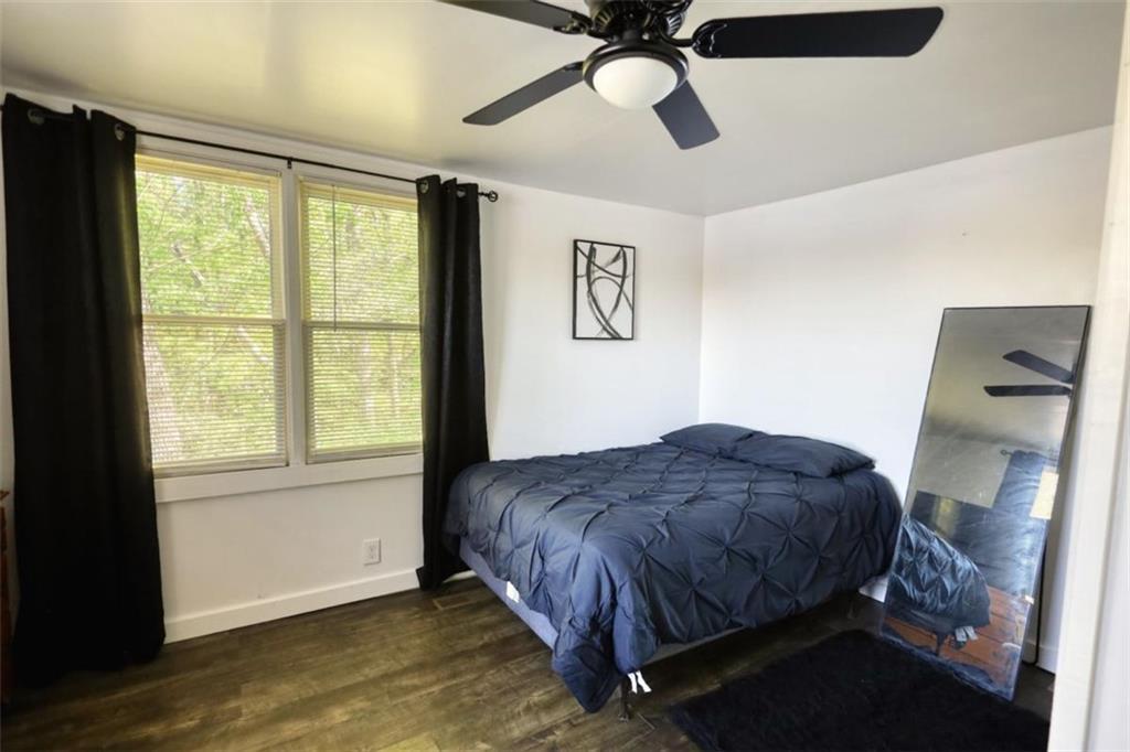 89 Miss Sarah Road Monticello, GA 31064 - Photo 42 of 77 a bedroom with a bed and window