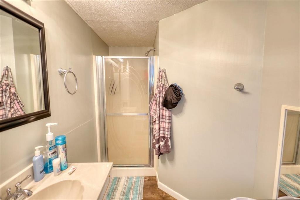 89 Miss Sarah Road Monticello, GA 31064 - Photo 46 of 77 a bathroom with a sink and a mirror