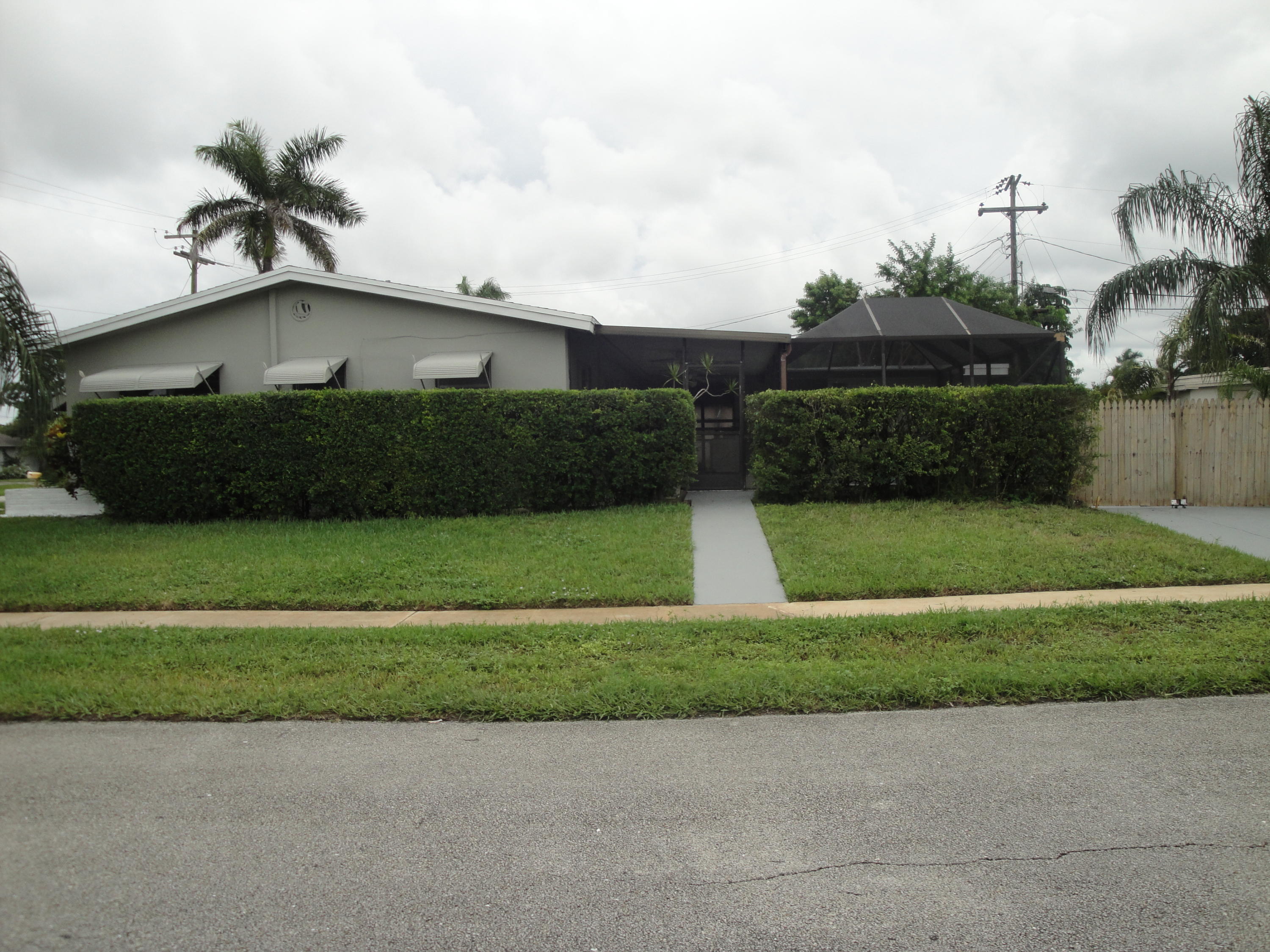 1403 High Ridge Road Lake Worth, FL 33461 - Photo 8 of 9 Pool/Patio Entrance