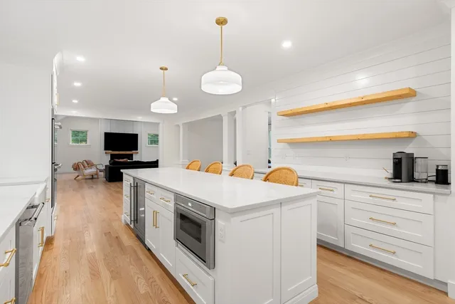 a kitchen with a stove and a sink