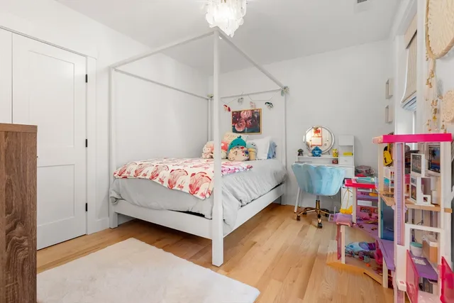 a bed room with a bed and a bed