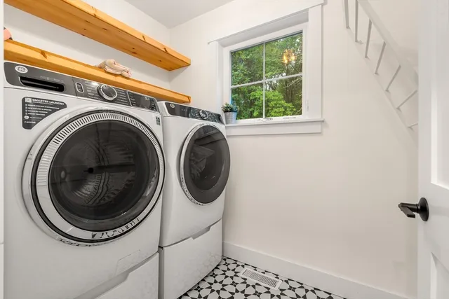 a utility room with dryer and washer