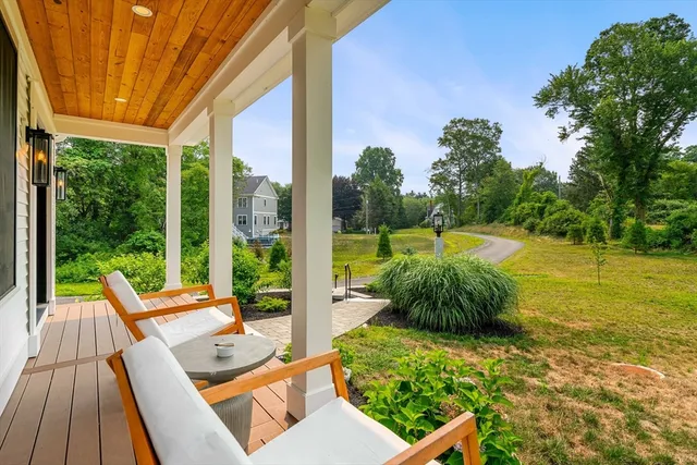 a garden view with a seating space