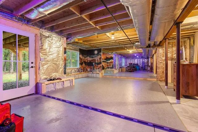 a view of a patio with table and chairs