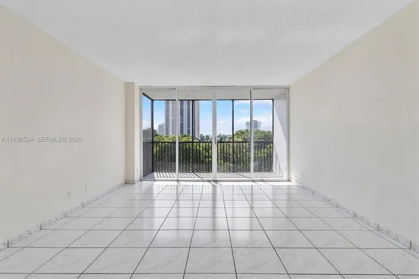 a view of an empty room and window