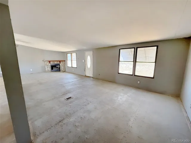 an empty room with windows