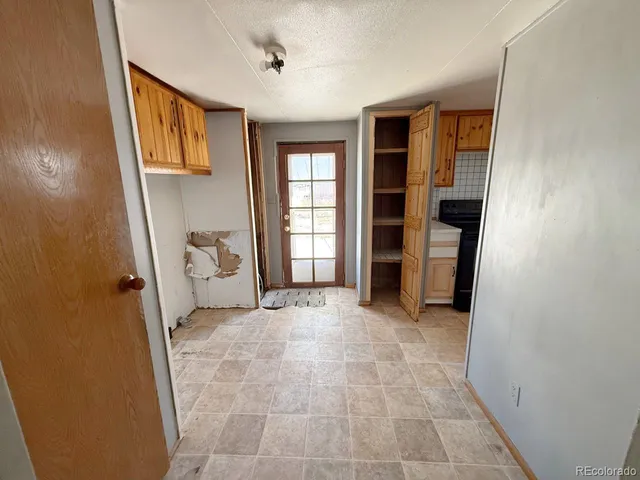 a view of a storage & utility room in a house
