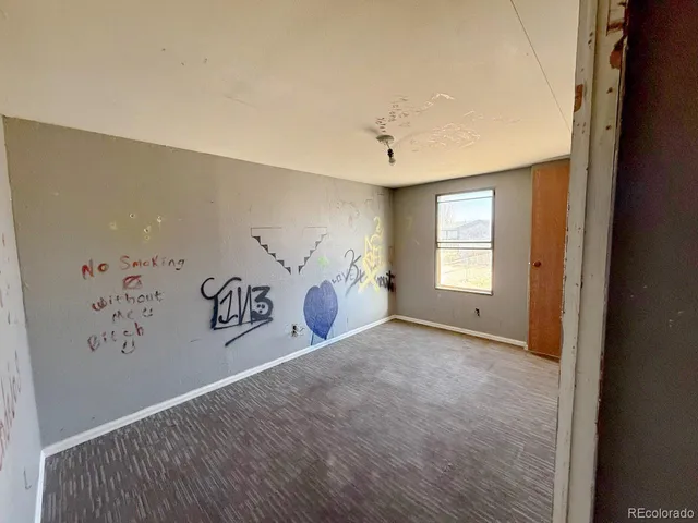 a view of a livingroom with a window