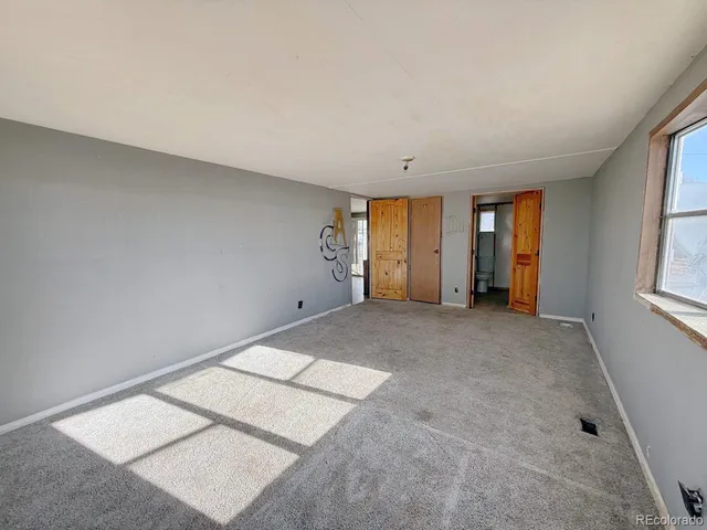 an empty room with windows