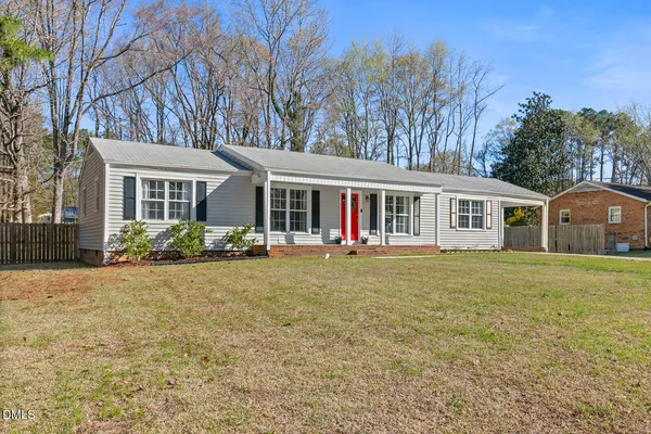 front view of a house with a yard
