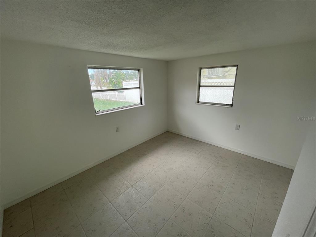 5311 Avery Road New Port Richey, FL 34652 - Photo 14 of 34 an empty room with windows