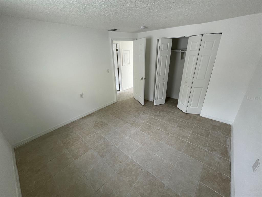 5311 Avery Road New Port Richey, FL 34652 - Photo 18 of 34 an empty room with closet area