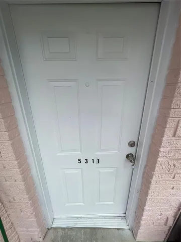 a view of a room with an empty space