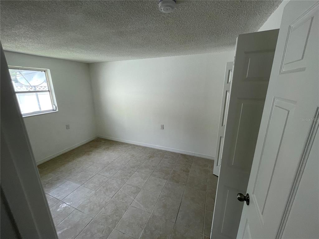 5311 Avery Road New Port Richey, FL 34652 - Photo 23 of 34 an empty room with windows