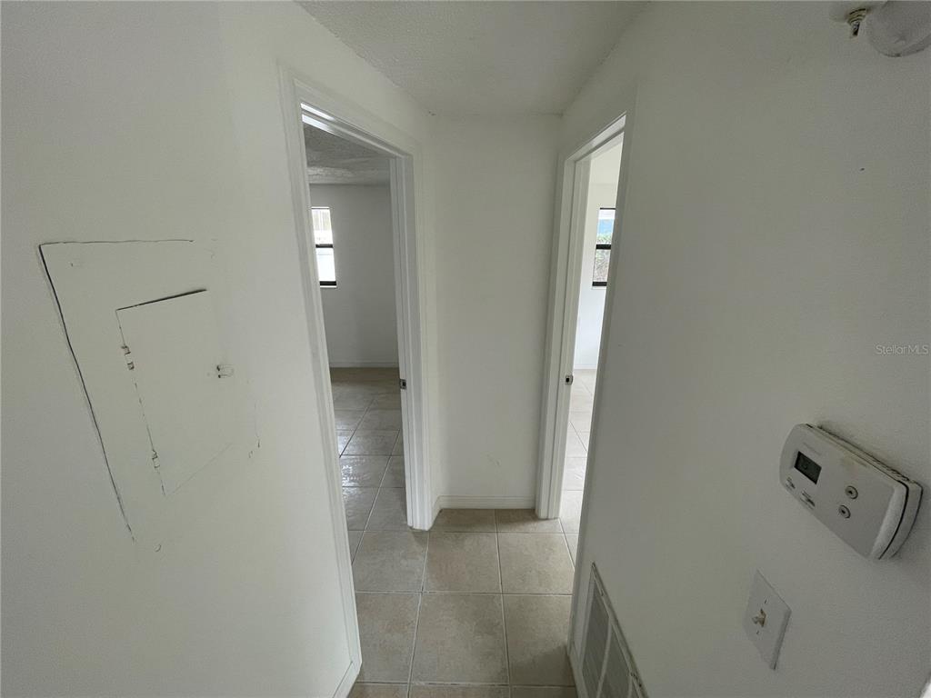 5311 Avery Road New Port Richey, FL 34652 - Photo 31 of 34 a view of a livingroom with a refrigerator