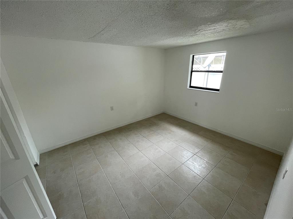 5311 Avery Road New Port Richey, FL 34652 - Photo 34 of 34 an empty room with windows
