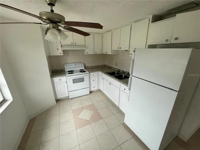 an empty room with a bathroom