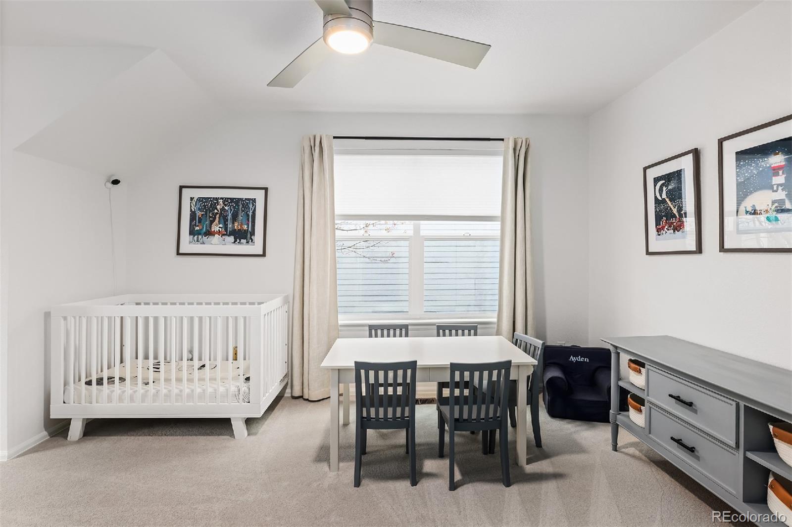 1947 King Street Denver, CO 80204 - Photo 19 of 40 a view of a livingroom with furniture and a window