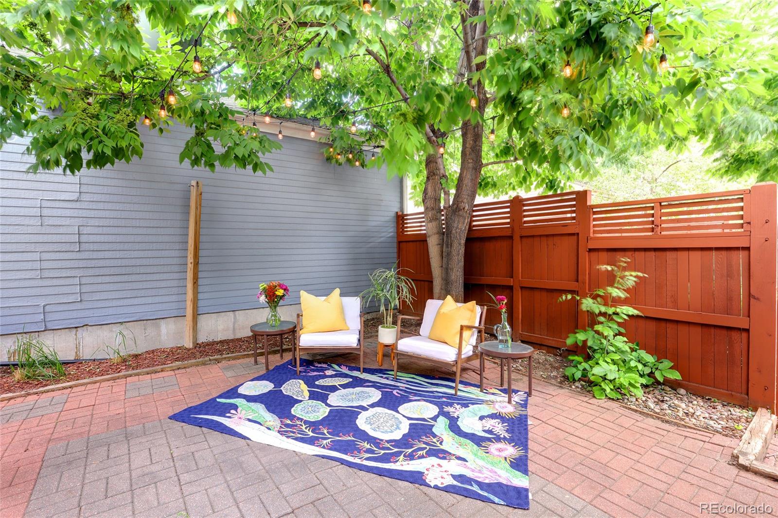 1947 King Street Denver, CO 80204 - Photo 29 of 40 a backyard of a house with seating space