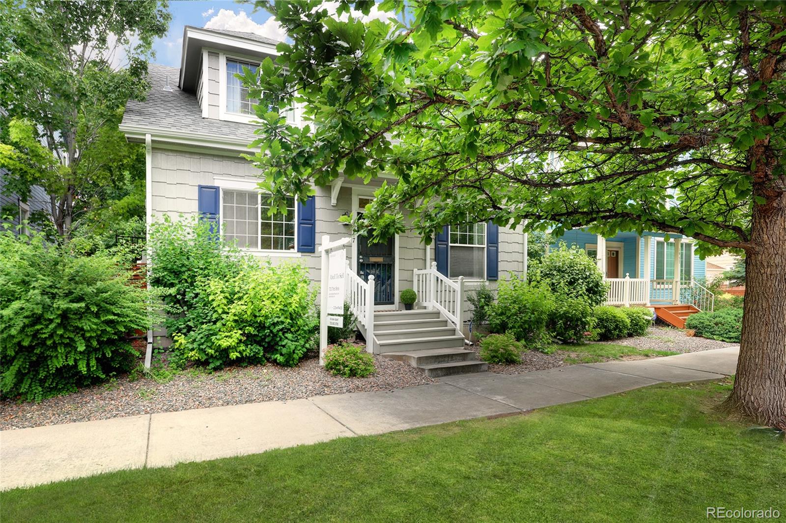 1947 King Street Denver, CO 80204 - Photo 3 of 40 a front view of a house with a garden