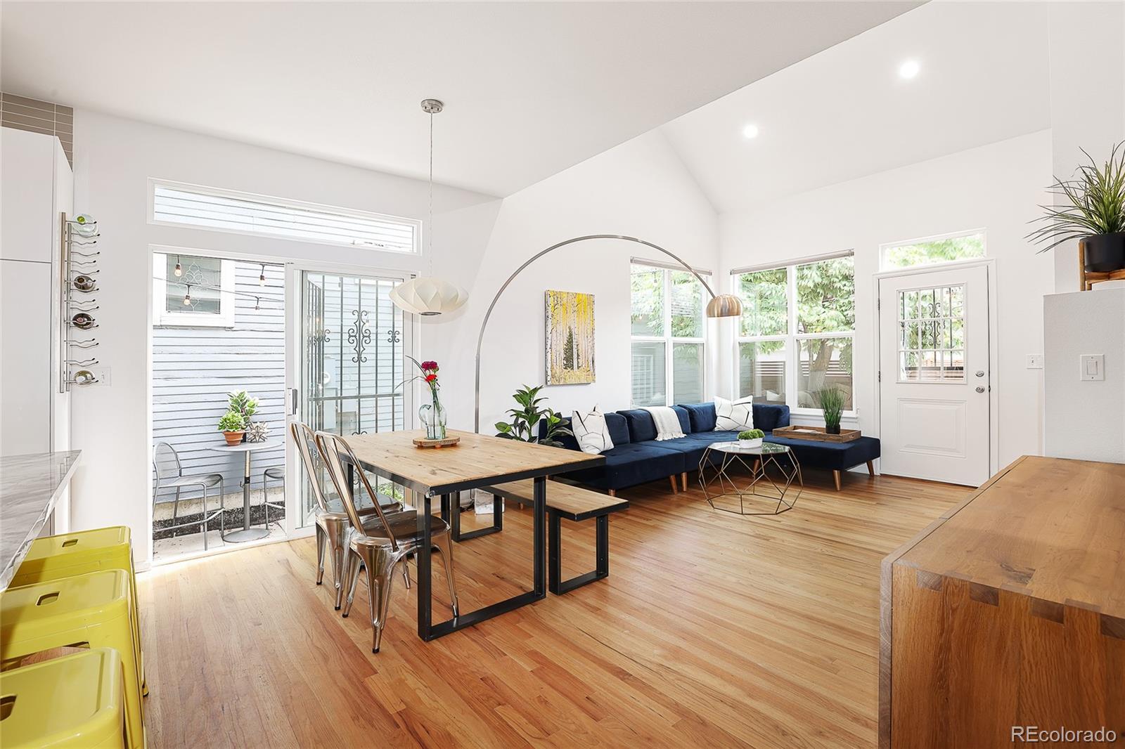 1947 King Street Denver, CO 80204 - Photo 9 of 40 a living room with furniture and wooden floor