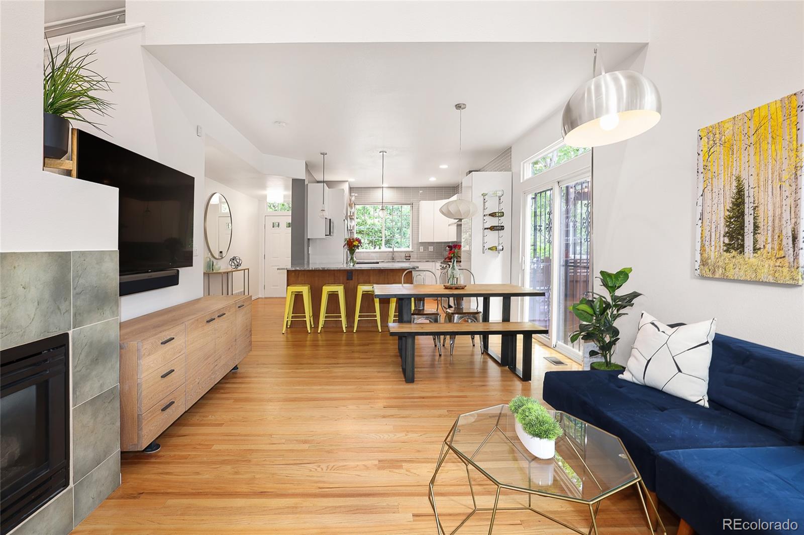1947 King Street Denver, CO 80204 - Photo 10 of 40 a large kitchen with a table and chairs