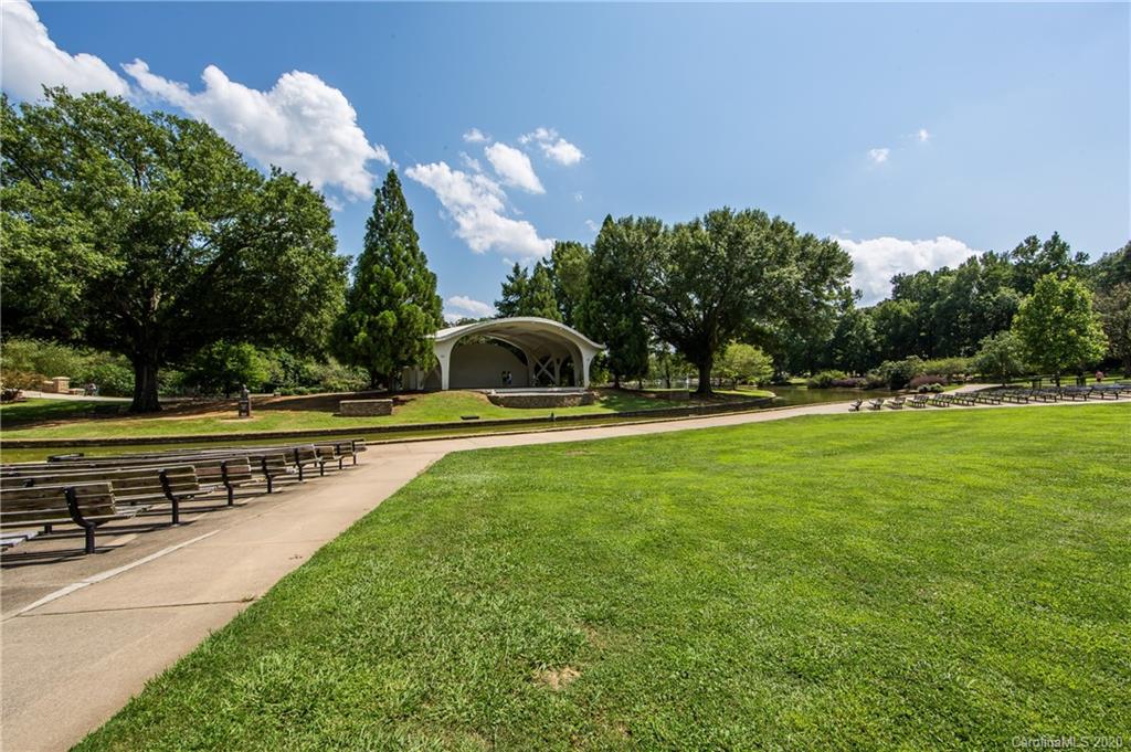 1501 Lilac Road Charlotte, NC 28209 - Photo 17 of 21 a swimming pool with outdoor seating and yard