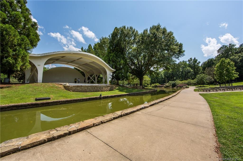 1501 Lilac Road Charlotte, NC 28209 - Photo 18 of 21 a view of swimming pool with a yard