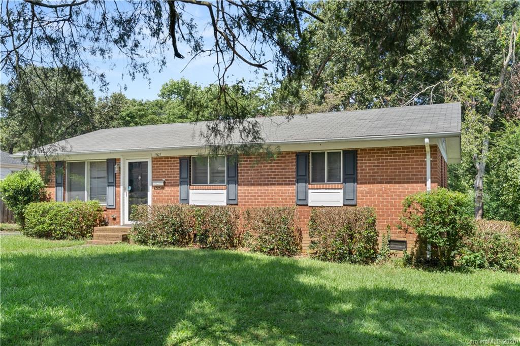 1501 Lilac Road Charlotte, NC 28209 - Photo 3 of 21 front view of a house with a yard