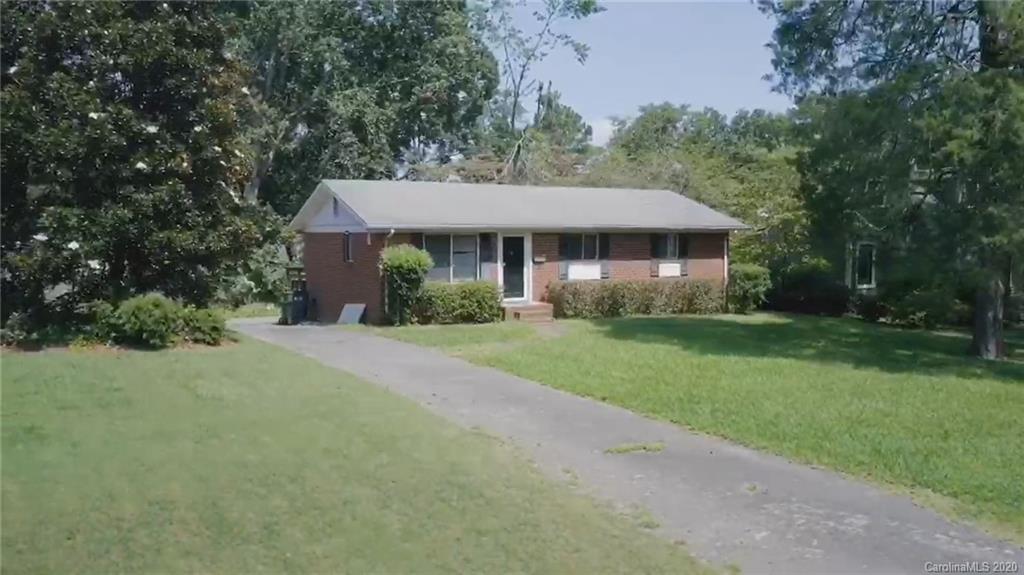 1501 Lilac Road Charlotte, NC 28209 - Photo 4 of 21 a front view of a house with garden