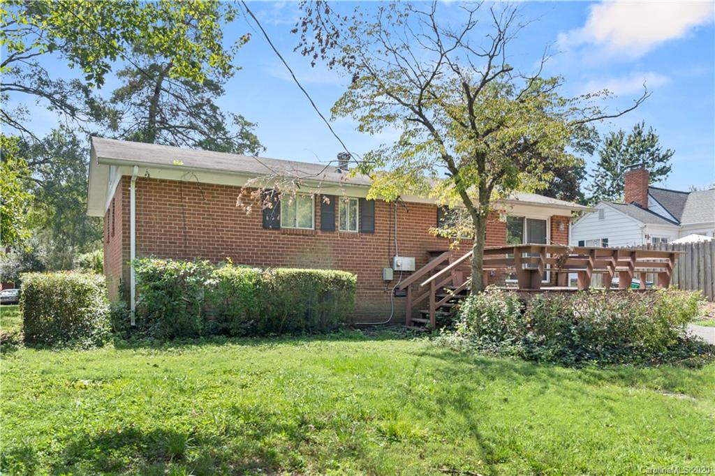 1501 Lilac Road Charlotte, NC 28209 - Photo 5 of 21 front view of a house with a yard
