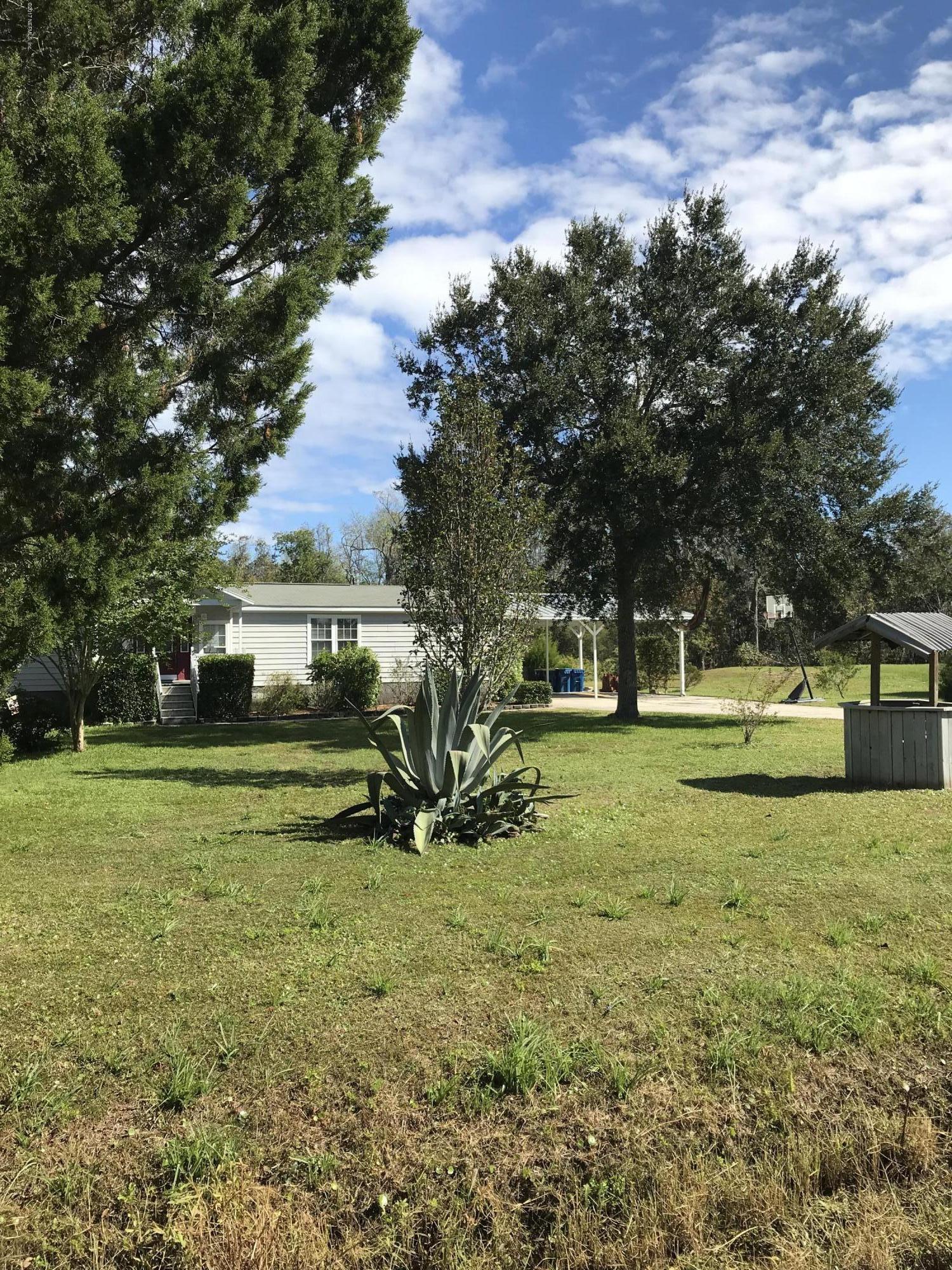 16113 Sawpit Road Jacksonville, FL 32226 - Photo 2 of 18 a view of a park with large trees