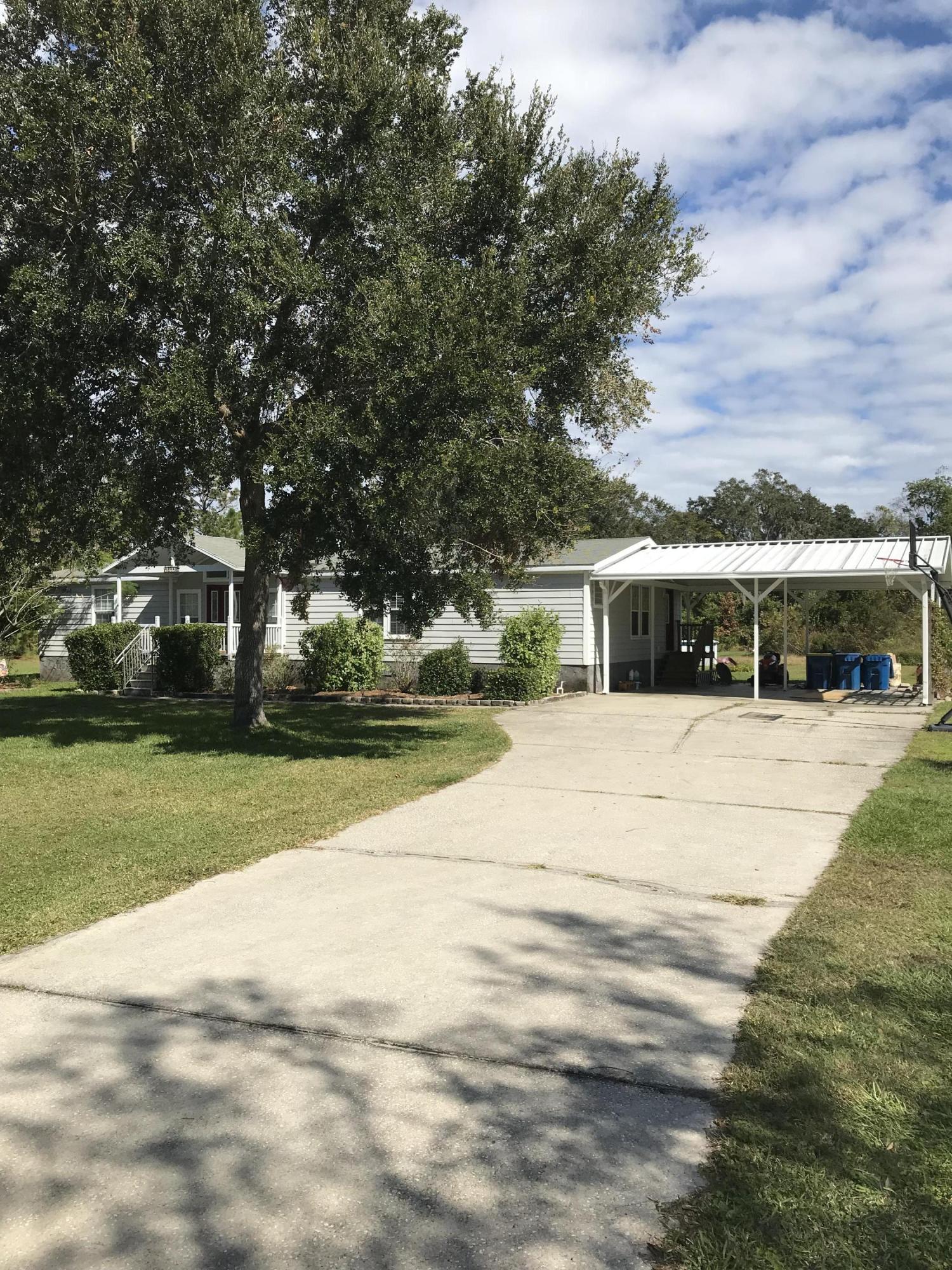 16113 Sawpit Road Jacksonville, FL 32226 - Photo 4 of 18 a view of house with yard