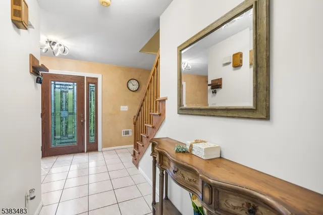 a view of a hallway with entryway