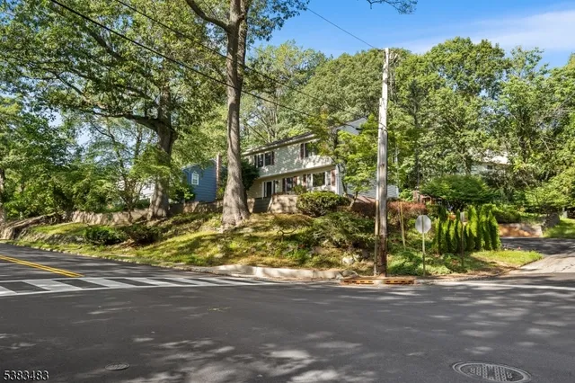 front view of a house with a street