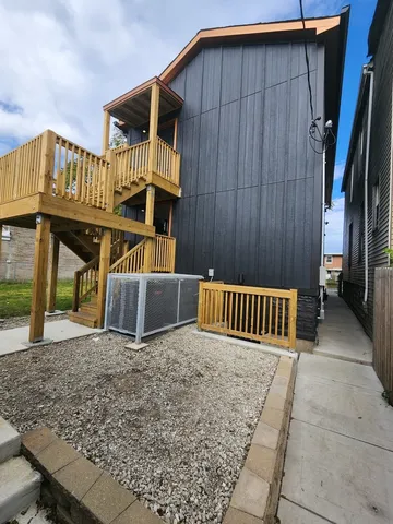 a front view of a house with parking area