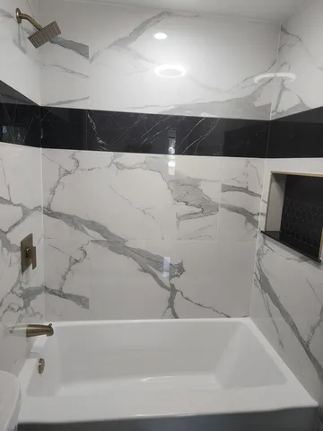 a bathroom with a bathtub